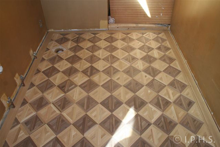 28.) Parquet tiles sanded